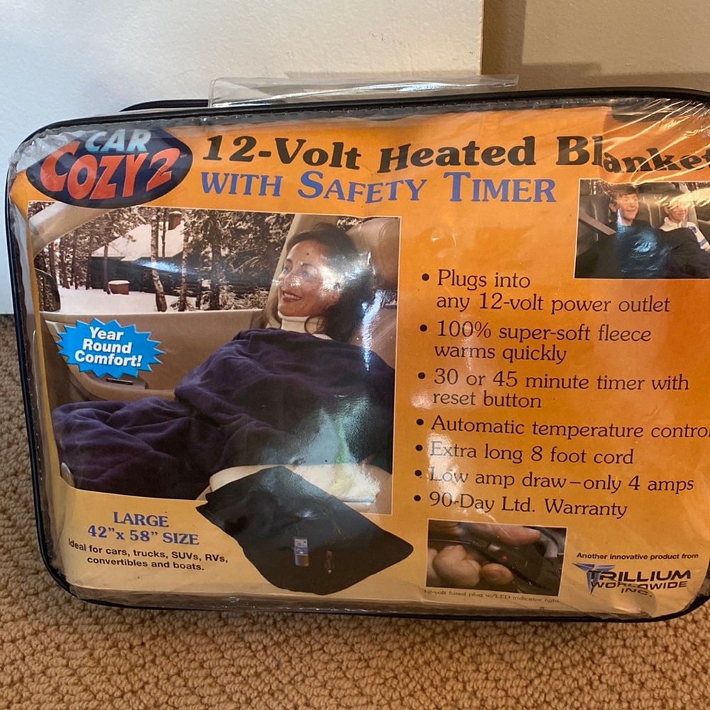 NEW never opened large heated blanket for cars, trucks, SUVs, RVs and boats!